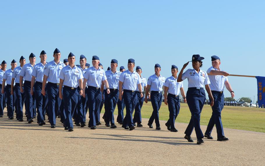 New airmen march during Air Force basic military training graduation June 23 at Joint Base San Antonio-Lackland Air Force Base in Texas. The service said it will meet its recruiting goal for 2022, but will start the next year with a smaller wait list to get a spot at boot camp. 