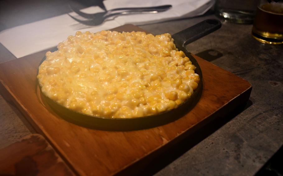 Steam rises from a corn cheese appetizer Feb. 21 at Yori in Cambridge, England. Patrons order through a QR code at the table.