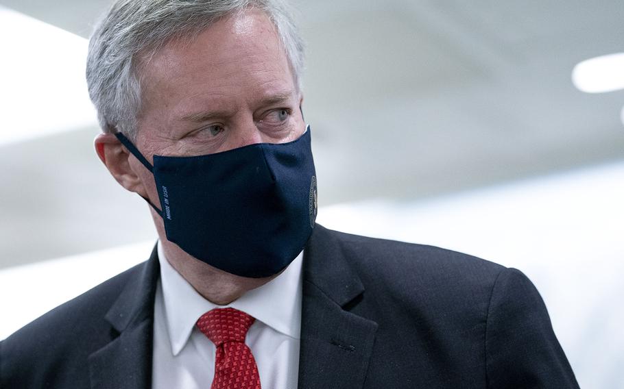 Then-White House Chief of Staff Mark Meadows wears a protective mask as he departed the Senate Republican policy luncheon in the Hart Senate Office Building on Capitol Hill on Oct. 21, 2020 in Washington, D.C. 