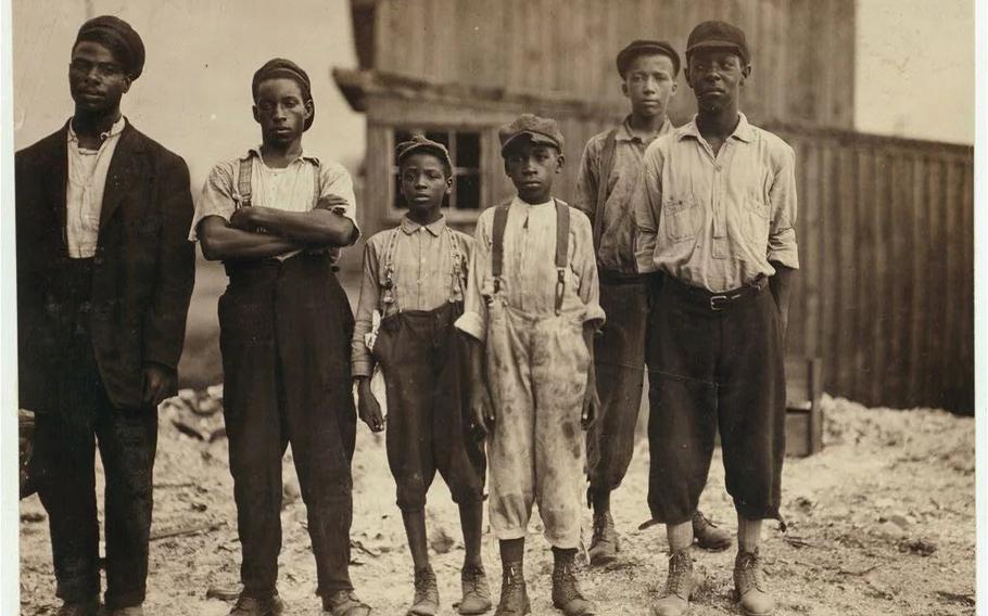 In 1911, Lewis Hine met these young workers at a glass factory in Alexandria, Va. Hine rarely took photos of Black children, who were typically not allowed to work alongside the white children he photographed.
