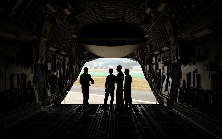 Soldiers stand inside a U.S. Air Force C-17 Globemaster III aircraft, manufactured by Boeing Co., during media day at the Seoul International Aerospace & Defense Exhibition at Seoul Air Base in Seongnam, South Korea, on Monday, Oct. 14, 2019.