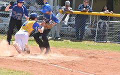 Sigonella pitcher Jackson Surls tags out Hohenfels' Nathan Angulo as he tried to score after a passed ball on Saturday, April 30, 2022, at Aviano Air Base, Italy.
