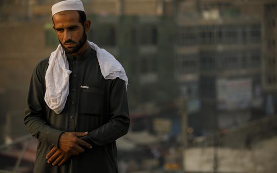 Zafar Khan, 23, who lost six family members, including his mother and three siblings, in an U.S. airstrike that killed nine including three children, one an infant crushed in his mother’s arms, poses for a portrait on a rooftop in Jalalabad, in Nangarhar Province, Afghanistan, on Nov. 3, 2017. The U.S. military said the Aug. 10 strike in Nangarhar province targeted militants who were observed loading weapons into a vehicle and there was zero chance of civilian casualties. But accounts from family members and Afghan officials contradict those assertions and point to the escalating human toll of America's air war in Afghanistan. (Marcus Yam / Los Angeles Times)