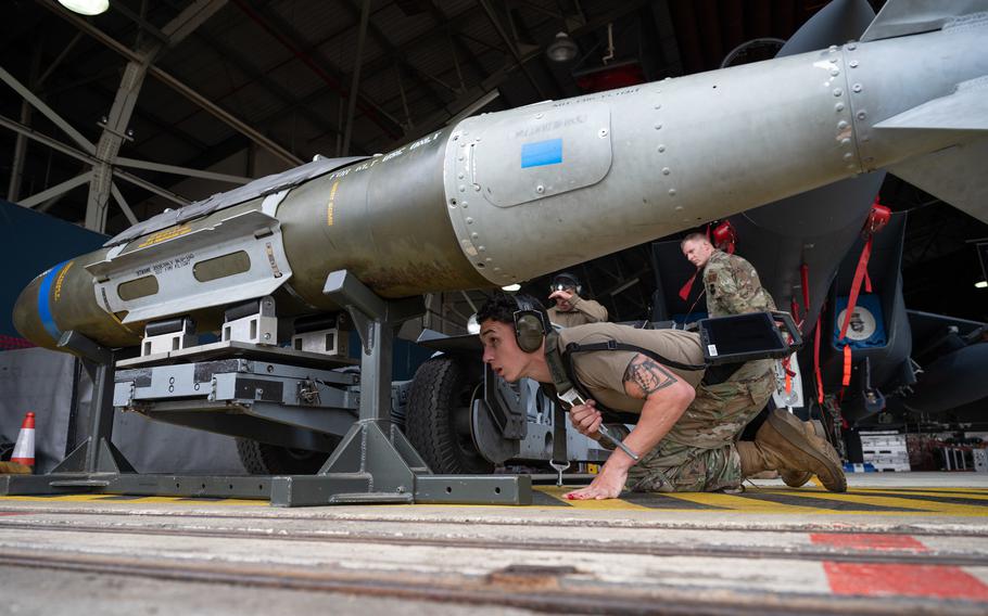 U.S. Air Force Staff Sgt. Dustin Mailloux, a 492nd Aircraft Maintenance Unit weapons load crew chief, inspects a Joint Direct Attack Munition during a quarterly load crew competition at Royal Air Force Lakenheath, England, July 1, 2021.