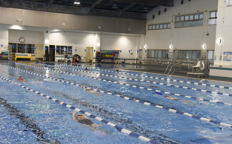 Swimmers practice the backstroke during the master’s advanced course at Yokota Air Base, Japan, Friday, May 27, 2022.