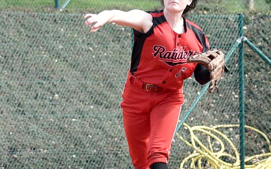 Kaiserslautern shortstop Xin Ai Robinson throws to first base during the first game of Saturday's doubleheader against the crosstown rival Royals on Ramstein Air Base, Germany.