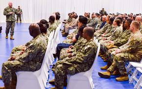 Master Chief Petty Officer of the Navy James Honea addresses sailors and Marines on April 16, 2025, during an all-hands call in Manama, Bahrain. He spoke about recruiting, military construction and veterans affairs, and answered audience questions.