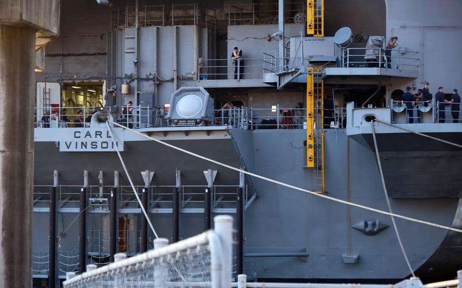 The USS Carl Vinson aircraft carrier arrives for a port call at Yokosuka Naval Base, Japan, Saturday, Aug. 28, 2021.