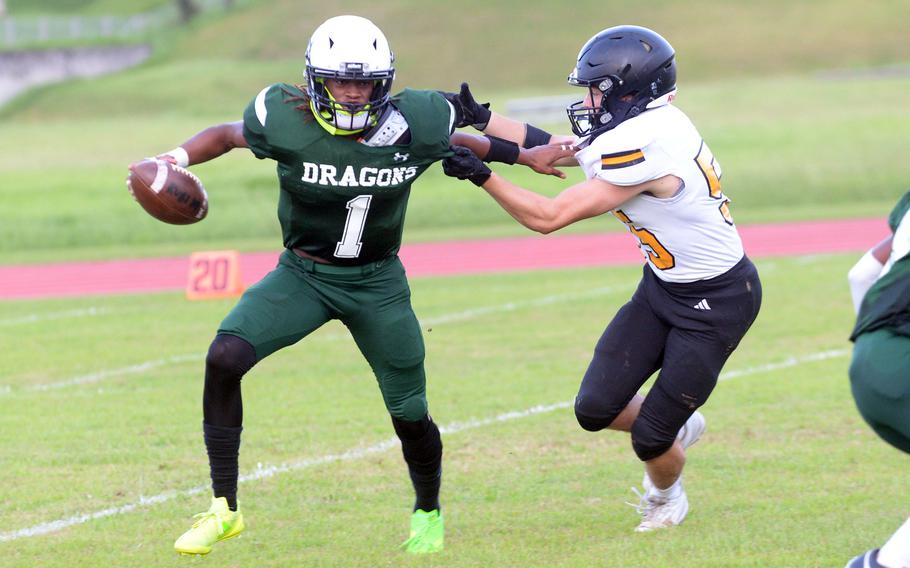 Carlos Cadet shrugs off a defender.