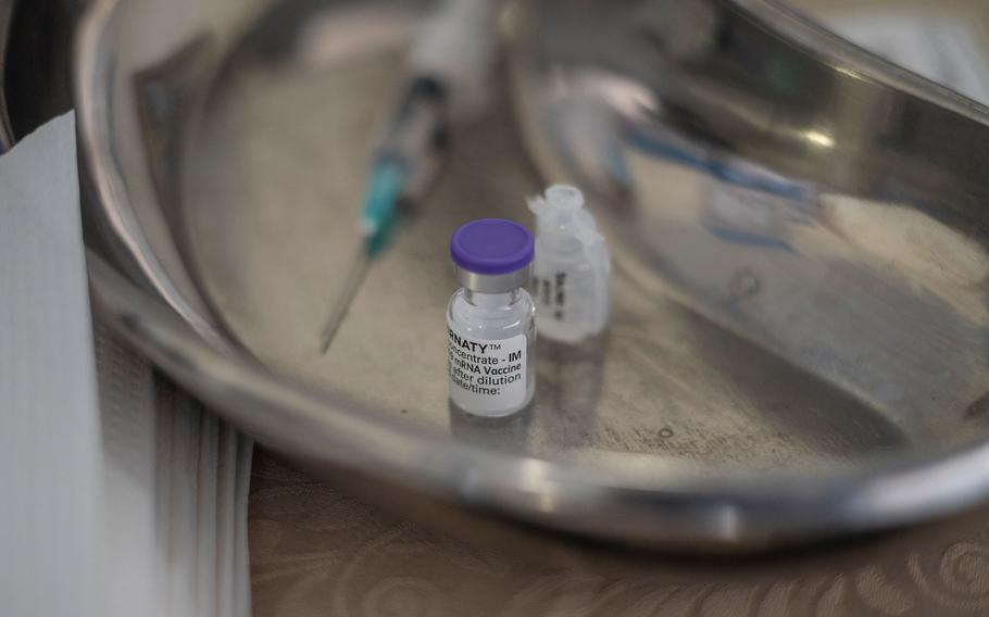 A vile containing Pfizer vaccine to be administered on elderly people at the SAVF Evanna Tehuis old age home is seen ahead of a vaccination run near Klerksdorp, on May 19, 2021.