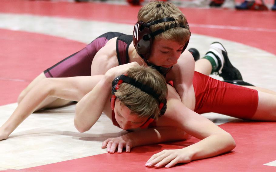 Perry's Xavier Mitchell takes control of King's Jack Snyder at 108 pounds.