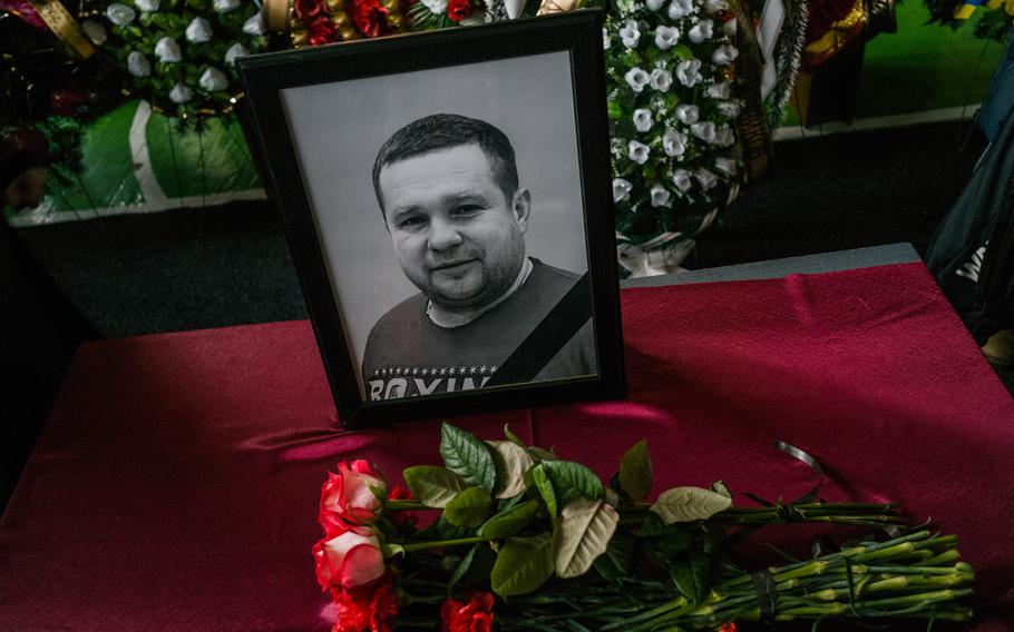 A photo of Mykhailo Korynovskyi is displayed at Korynovskyi’s funeral on January 17, 2023. The 39-year-old boxer trainer was killed in a Russian rocket attack on an apartment building in Dnipro, Ukraine.