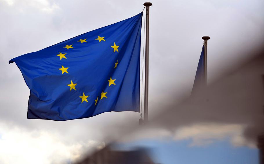 A European Union flag flies in Brussels on Oct. 7, 2020. 