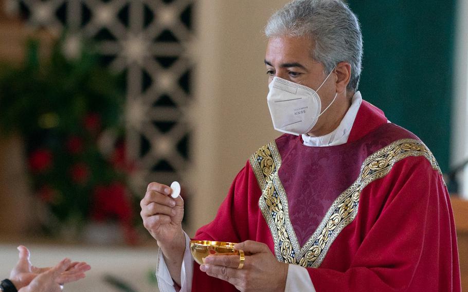 Monsignor Edward Filardi of St. Paul Catholic Church in Damascus, Md., leads a Saturday service.
