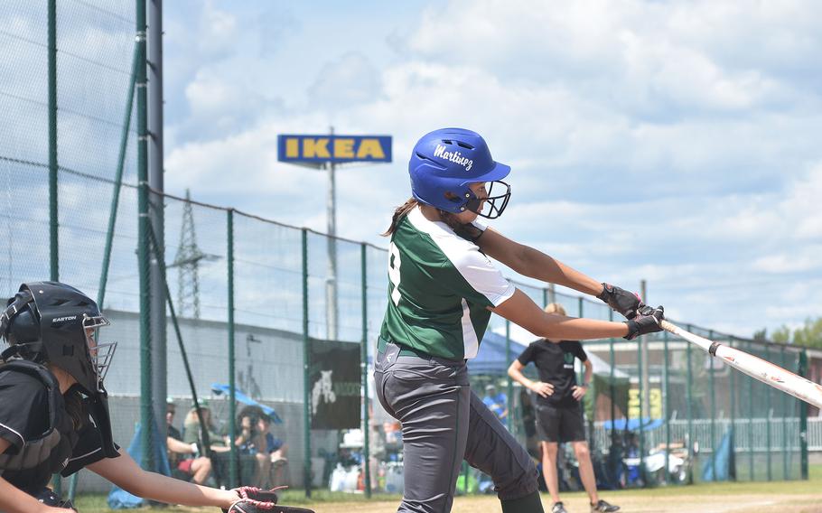 Naples' JuJu Martinez, named most valuable player of the DODEA-Europe Division II/III softball championships, hits a double on Saturday, May 21, 2022, at Kaiserslautern, Germany.