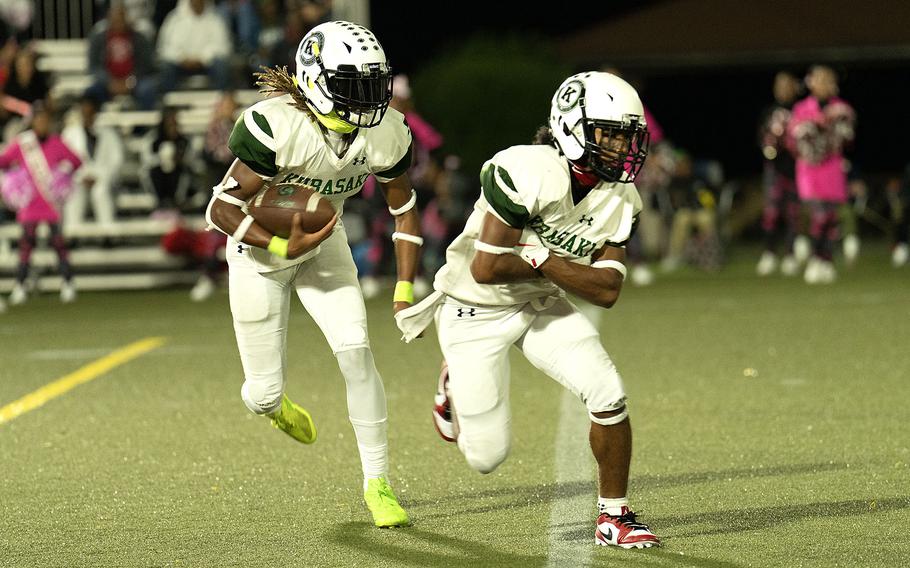 Carlos Cadet runs with the football.