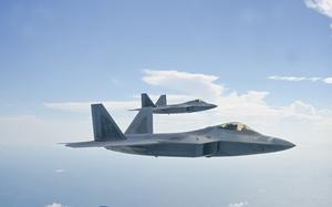 F-22 Raptors from the 27th Fighter Squadron at Joint Base Langley-Eustis, Va., fly in formation during a training sortie over Georgia, Sept. 14, 2023. 