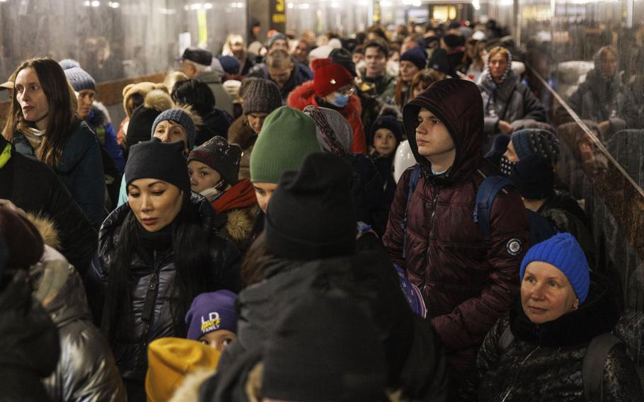 Displaced Ukrainians make their way to a platform at Lviv-Holovnyi railway station in Lviv, Ukraine on March 14, 2022. 