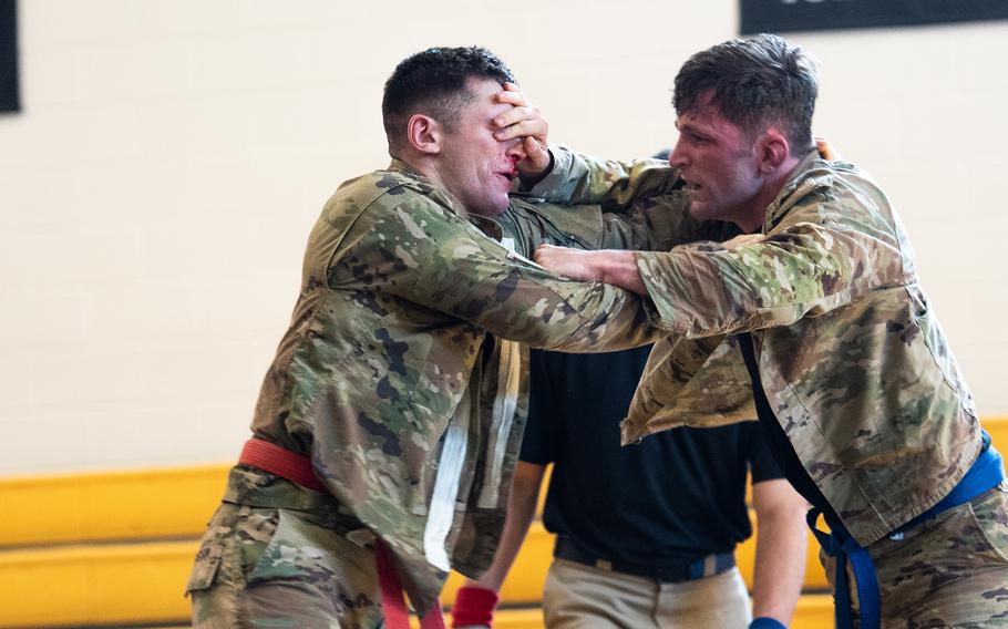 Soldiers fight Tuesday, April 11, 2023, in a bout during the annual Lacerda Cup All-Army Combatives Championship bout at Fort Benning, Ga. 