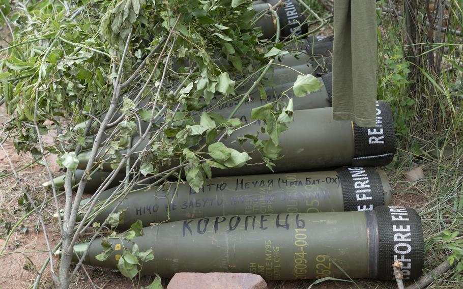U.S.-supplied M777 howitzer shells lie on the ground to fire at Russian positions in Ukraine’s eastern Donbas region June 18, 2022. 