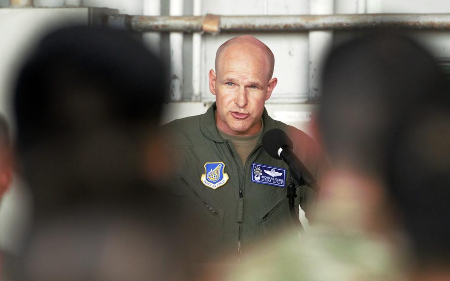 Col. Nicholas Evans speaks to his airman after taking command of the 18th Wing at Kadena Air Base, Okinawa, Thursday, July 6, 2023. 