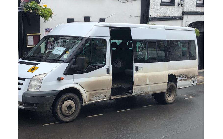 Neighbors filled Tom Littledyke's minibus with supplies while it was parked outside his home in Lyme Regis, U.K. 
