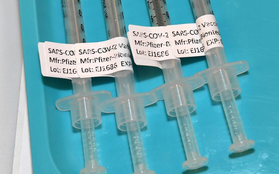 Syringes with the Pfizer-BioNTech COVID-19 vaccine. 