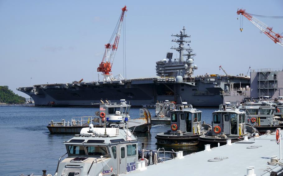 The aircraft carrier USS Ronald Reagan undergoes maintenance at its homeport, Yokosuka Naval Base, Japan, April 23, 2023.