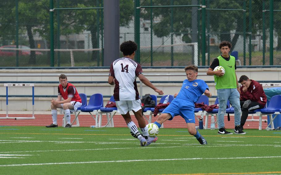 Ramstein’s Jayden Andrews goes for the ball against Vilsecks Adrian Ward during pool play at the DODEA-Europe Soccer Championships on Ramstein Air Base, Germany, May 16, 2022.