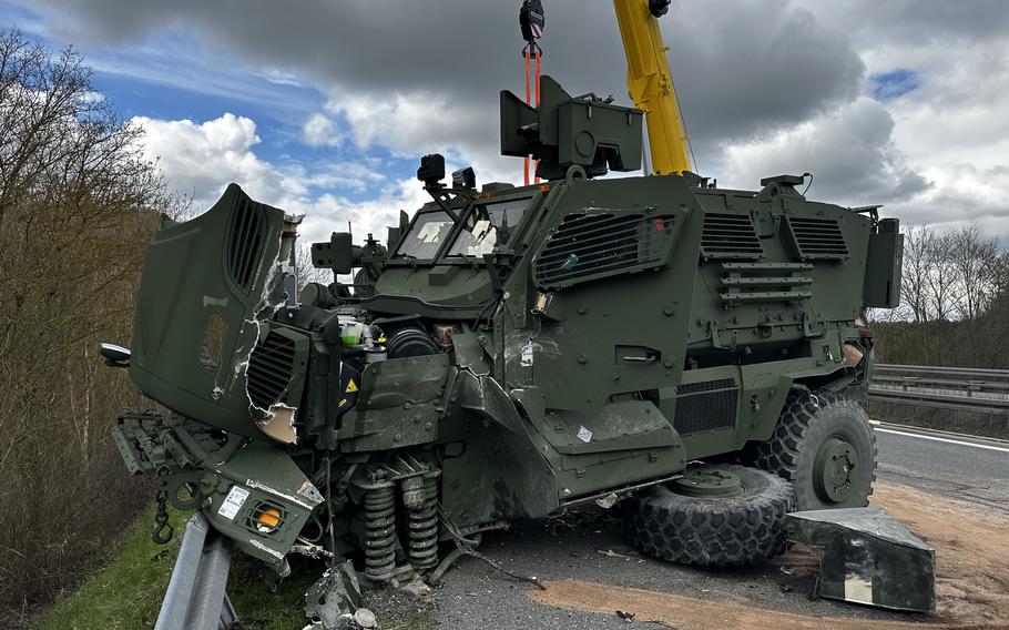 A Mine Resistant Ambush Protected vehicle is being recovered after a crash April 17, 2023, on highway A6 near Amberg, Germany. Seven military vehicles were traveling between Sulzbach-Rosenberg and Amberg-West in Bavaria, when the collision occurred. One injured solider was transported by helicopter and six by ambulance to local hospitals.