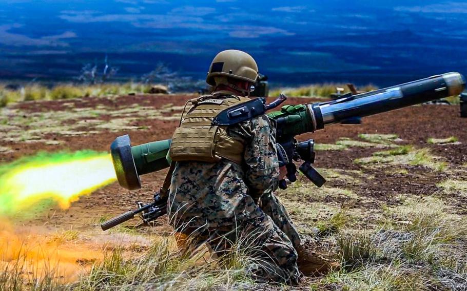 A member of 1st Battalion, 3rd Marines fires a Javelin missile during exercise Bougainville II at Pohakuloa Training Area, Hawaii, April 18, 2021.