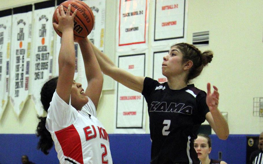 King's Katelyn Mapa and Zama's Isabella Rivera Munoz tangle for the ball.