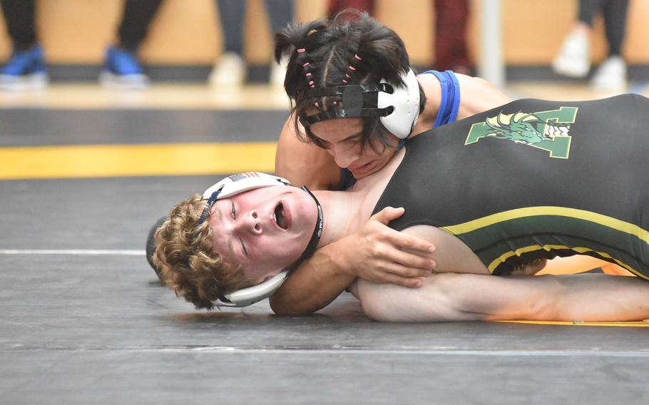 Ramstein’s Isaac Martinez controls Alconbury’s Ayden Hinsey in a 157-pound semifinal match Saturday, Feb. 10, 2024, at the DODEA European Wrestling Championships in Wiesbaden, Germany.