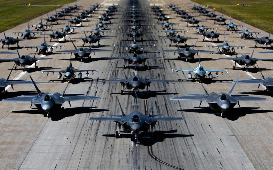 F-16 Fighting Falcons, F-22 Raptors and F-35 Lightning IIs take part in a large formation exercise at Eielson Air Force Base, Alaska, Aug. 12, 2022.