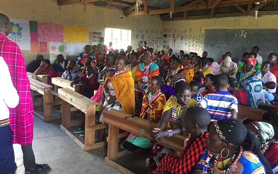 Maasai villagers gather in southern Kenya, where Air Force Tech. Sgt. Fariht Gomez first visited in 2018. Gomez is coordinating the donation of about two tons worth of supplies from U.S. airmen in England to help the village. 