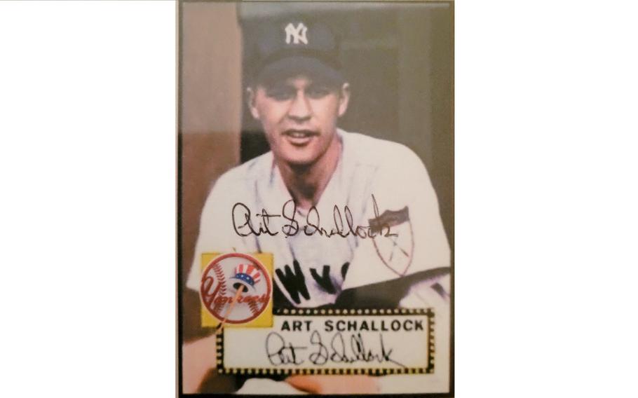 A signed baseball card of Art Schallock during his time as a member of the New York Yankees. The 98-year-old Navy veteran, who pitched for the Yankees, is the oldest surviving MLB player.