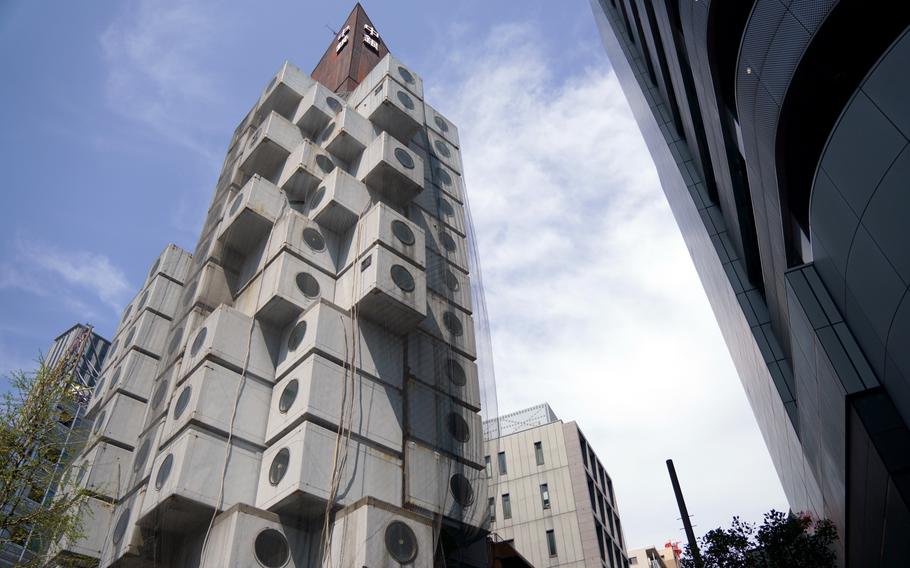 Tokyo's landmark Nakagin Capsule Tower, which resembles stacks of washing machines, has attracted admirers from around the world. It appeared in TV shows and films in Japan and overseas.