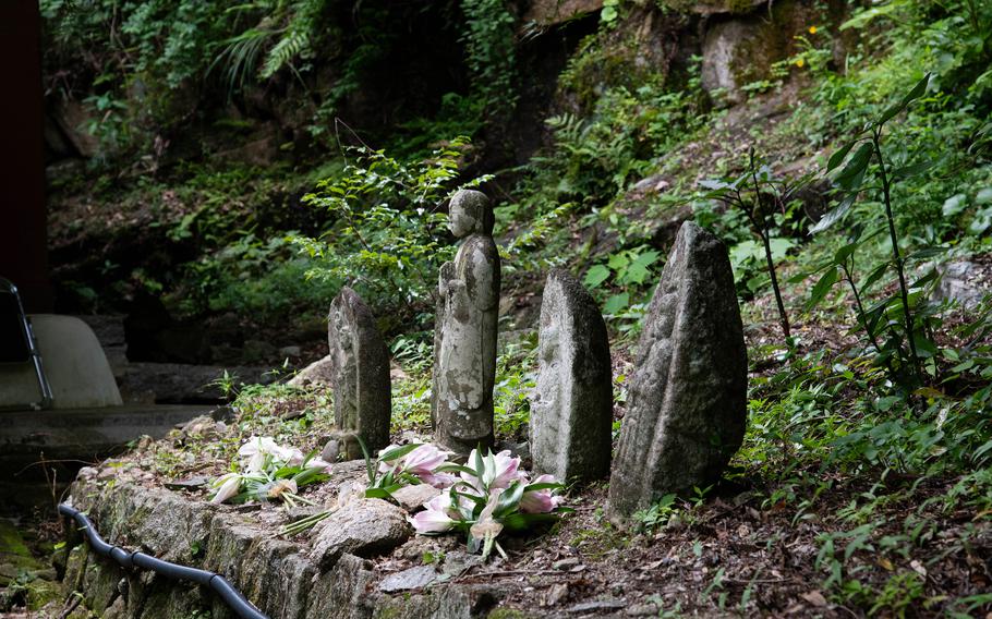 Statues honor American airmen at a temple in Japan. 