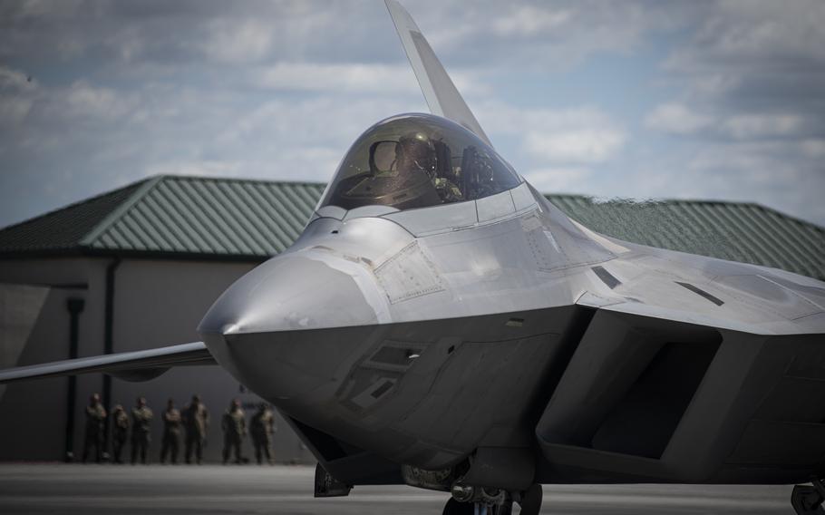 A U.S. Air Force pilot assigned to the 149th Fighter Squadron, Virginia Air National Guard, prepares for takeoff in an F-22 Raptor at the Air Dominance Center in Savannah, Ga., May 11, 2022. 