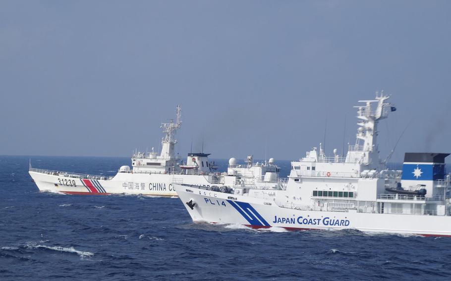 A Japan Coast Guard cutter shadows its Chinese equivalent in the East China Sea in this undated image. 
