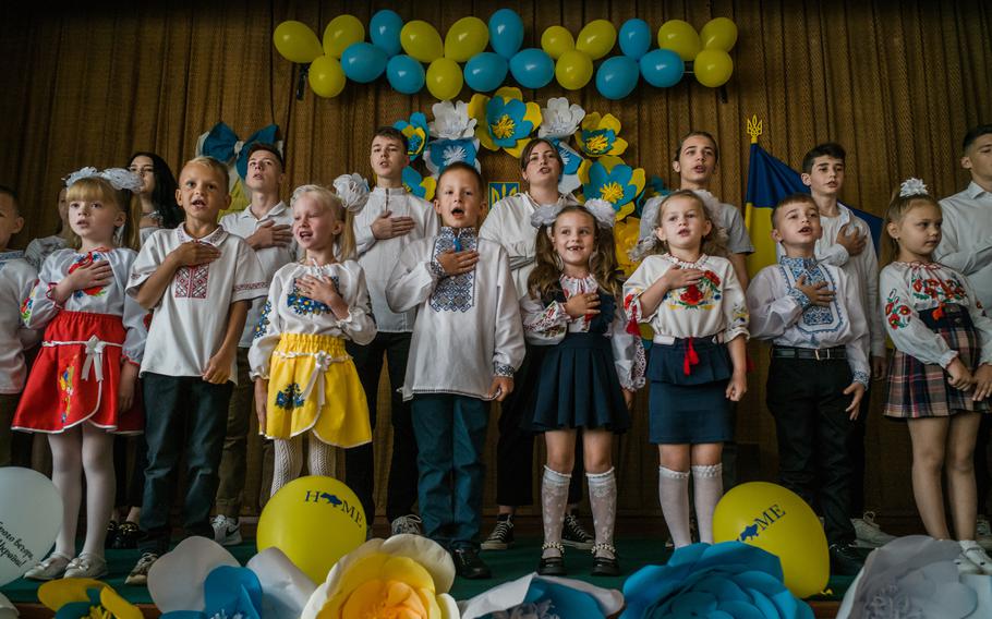 First-grade students during an official ceremony marking the start of the school year in Nove Zalissya, Ukraine. 