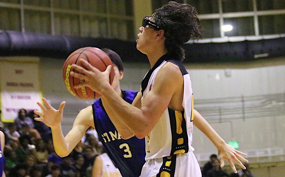 Kadena's Angel Torrado looks to shoot against St. Mary's in the boys D-I final.