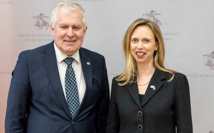 U.S. Ambassador to Lithuania Kara McDonald poses with Defense Minister Arvydas Anusauskas at a meeting in Vilnius, Lithuania, Feb. 22, 2024. Anusauskas pledged to improve living conditions for U.S. troops on rotation to Lithuania.