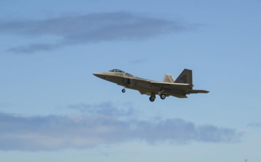 An F-22 Raptor, assigned to the 199th Fighter Squadron, lands on Joint Base Pearl Harbor-Hickam, Hawaii, in 2017.  