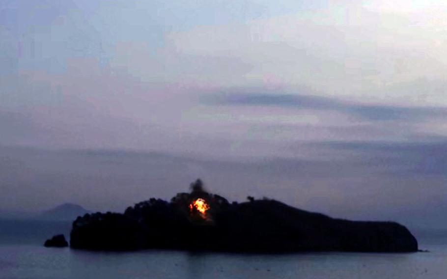 A North Korean missile appears to hit its island target in this image released by the state-run Korean Central News Agency, Friday, Jan. 28, 2022.