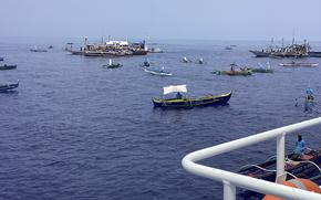 In this photo provided by the Philippine coast guard, fishing boats carrying activists and volunteers belonging to a nongovernment coalition called Atin Ito, Tagalog for This is Ours, pass by waters off Palauig Point, Zambales province, northwestern Philippines as they head towards Scarborough Shoal on Wednesday May 15, 2024. A flotilla of about 100 mostly small fishing boats led by Filipino activists sailed Wednesday to a disputed shoal in the South China Sea, where Beijing's coast guard and suspected militia ships have used powerful water cannons to ward off what they regard as intruders.