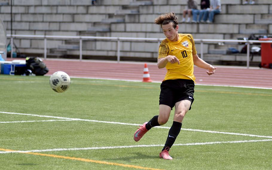 Stuttgart attacking midfielder Cristian Ingle crosses the ball during a Division I semifinal match against Lakenheath at the 2025 DODEA European championships on May 21, 2025, at Kaiserslautern High School in Kaiserslautern, Germany.