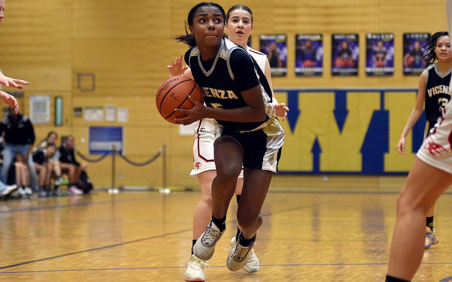 Vicenza sophomore Ally Taylor drives the lane during a Division II semifinal against American Overseas School of Rome at the DODEA European Basketball Championships on Feb. 16, 2024, at Wiesbaden High School in Wiesbaden, Germany.