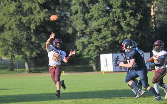 Vilseck QB Aron Atakuzi airs out the ball on the final drive against Lakenheath on Friday, Sept. 15 in Vilseck, Germany.