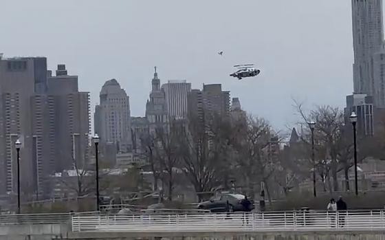 A helicopter falling into a river.